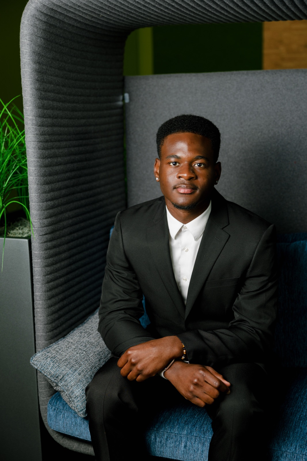 Daniel Esambu, seated portrait