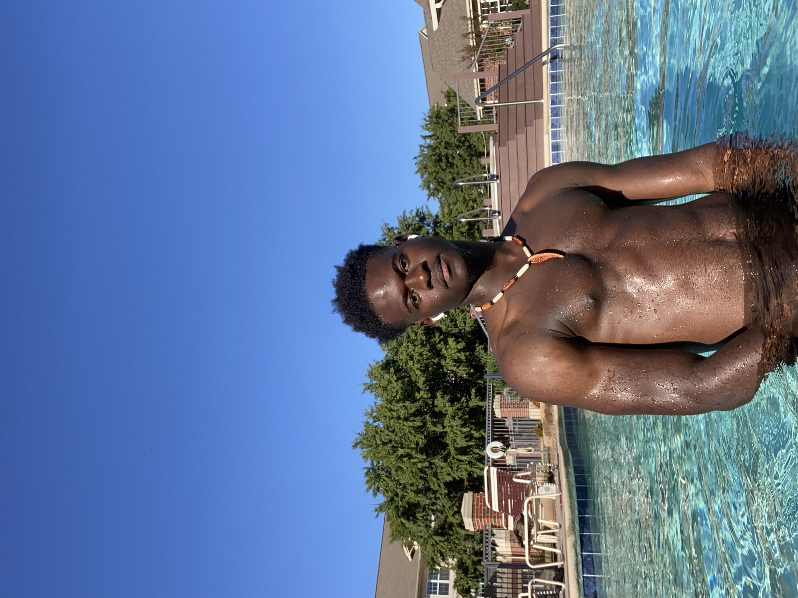 Daniel Esambu poolside